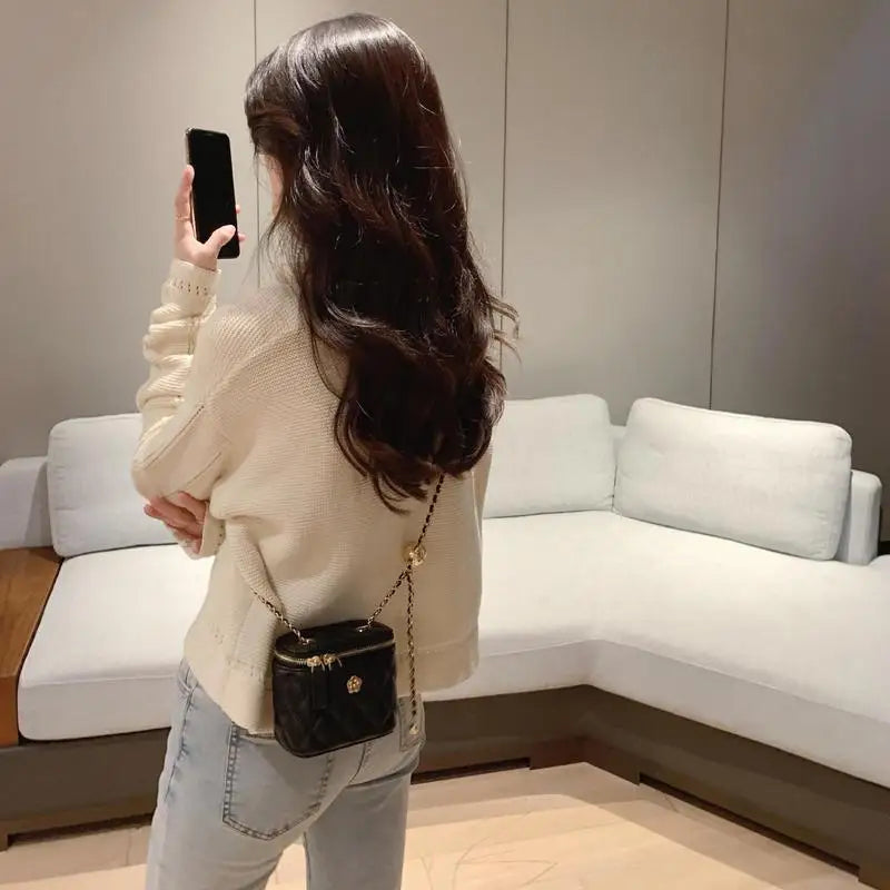 Floral chain mini crossbody bag