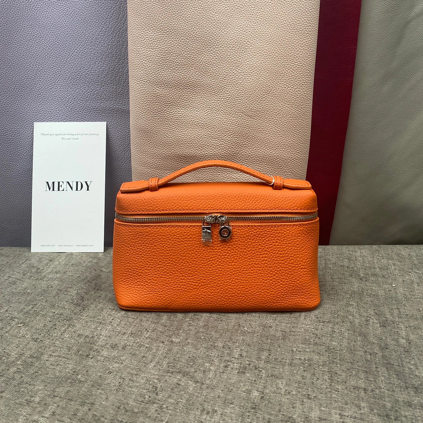 ew genuine leather  mobile phone handbag for women. Exclusive to women, with a luxurious design and compact and exquisite ap