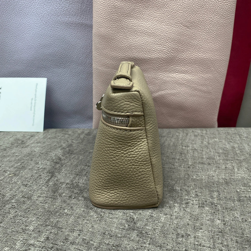 ew genuine leather  mobile phone handbag for women. Exclusive to women, with a luxurious design and compact and exquisite ap