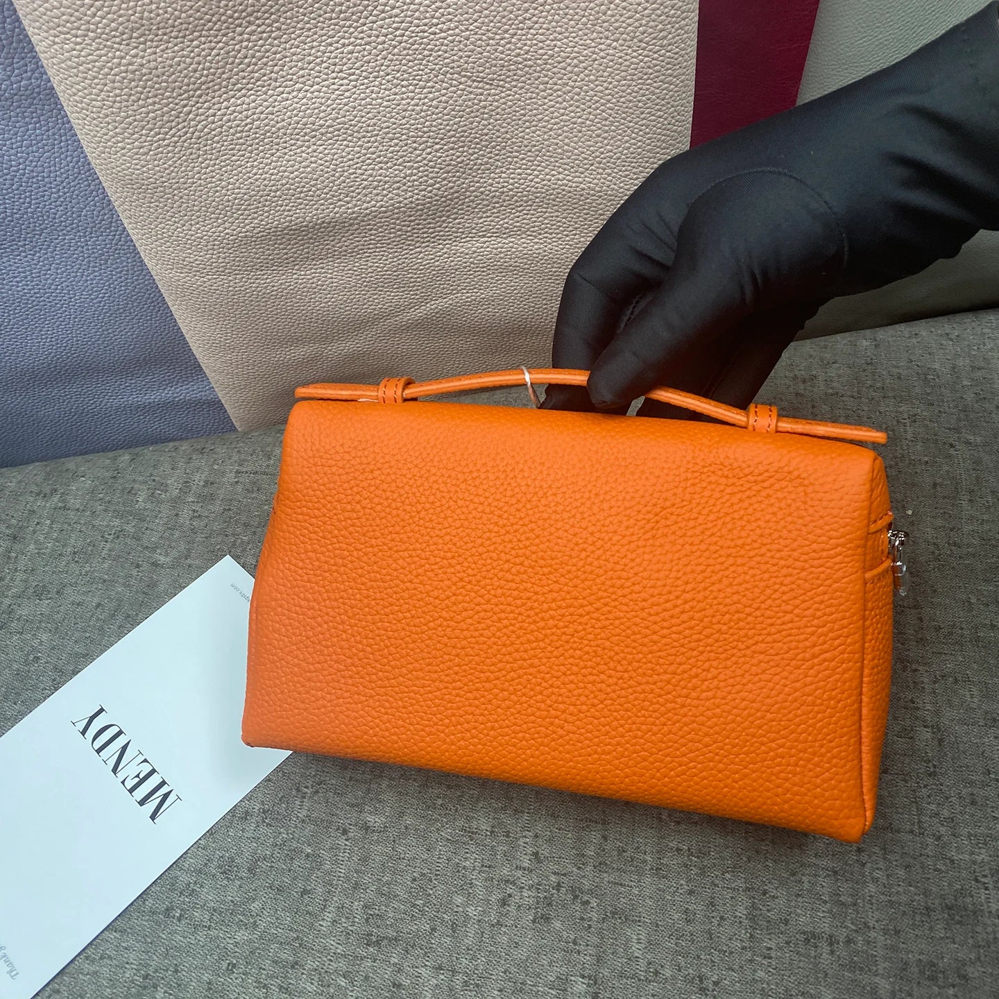 ew genuine leather  mobile phone handbag for women. Exclusive to women, with a luxurious design and compact and exquisite ap